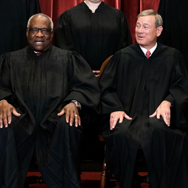 washington, dc   april 23 members of the supreme court pose for a group photo at the supreme court in washington, dc on april 23, 2021 seated from left associate justice clarence thomas, chief justice john roberts and associate justice stephen breyer photo by erin schaff poolgetty images