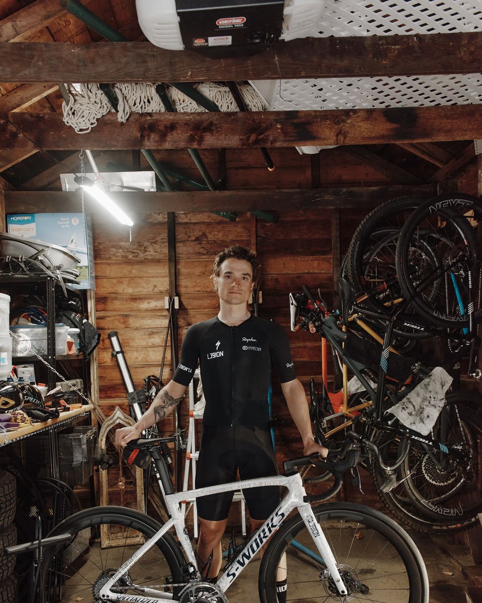 robin carpenter standing behind his s works bike in garage