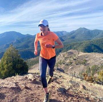 runner and scientist megan roche running on a trail