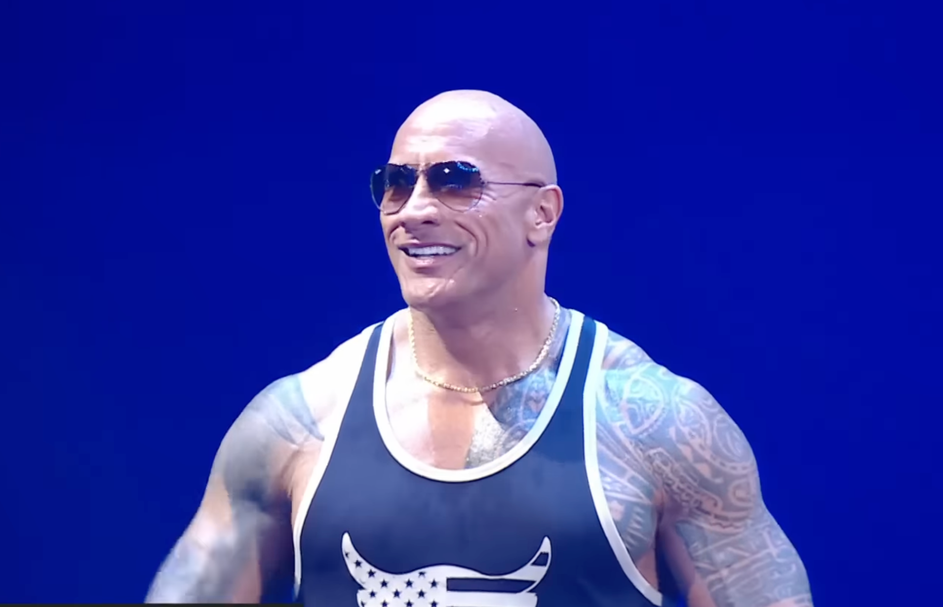 Watch The Rock Return to WWE and Challenge Roman Reigns to a Grudge Match