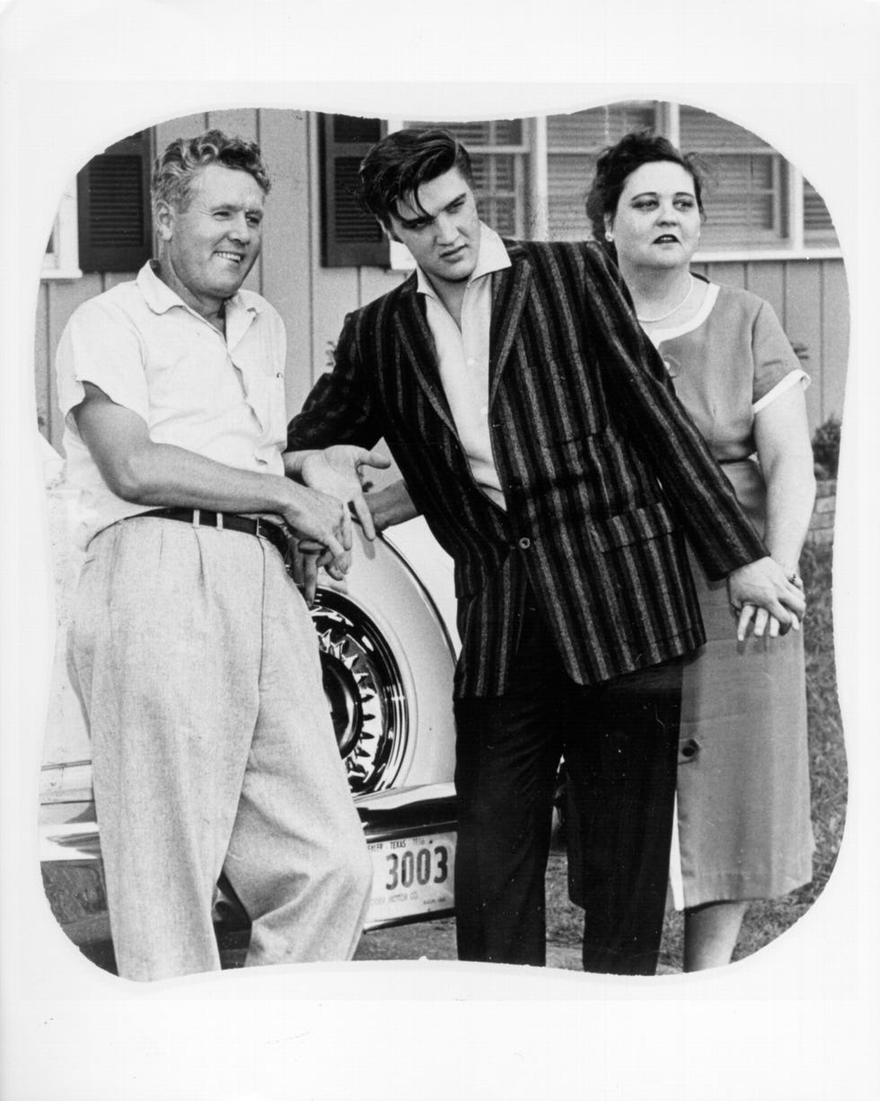 elvis presley with his parents