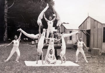 us olympic gymnasts pose in pyramid