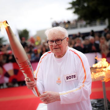 a man holding a baton