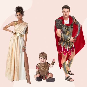women, baby, man, kid dressed in roman empire halloween costumes