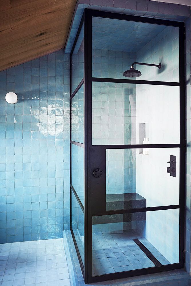 shower with blue tile