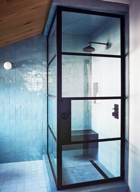 shower with blue tile