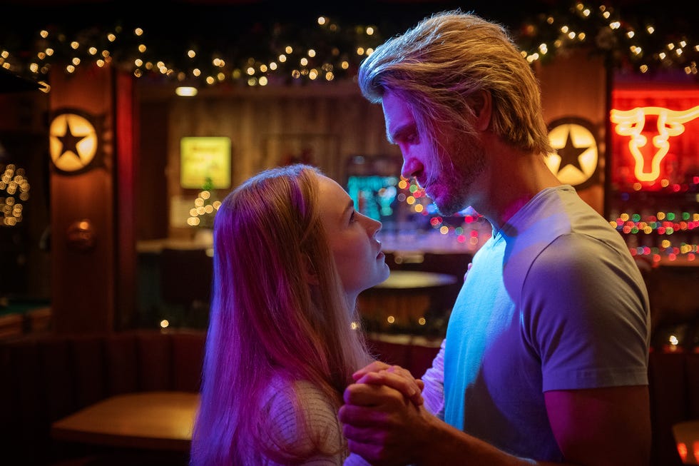 britt robertson as ashley and chad michael murray as luke share a dance in the merry gentlemen