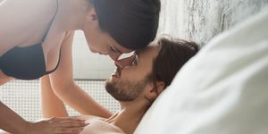 romantic couple enjoy sensual foreplay before sex in bedroom