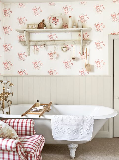 romantic bathroom with cabbage rose wallpaper