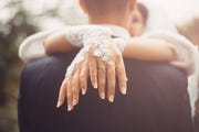 romantic hugs of newlyweds