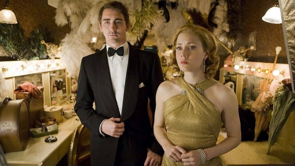 lee pace and amy adams attend a party in a scene from miss pettigrew lives for a day, a good housekeeping pick for best romantic movies