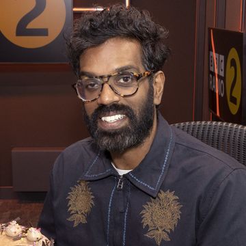 romesh ranganathan with a radio 2 cake