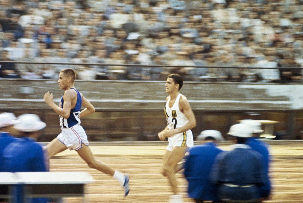 Billy Mills Passing Ron Clarke in 10,000 Meter Run