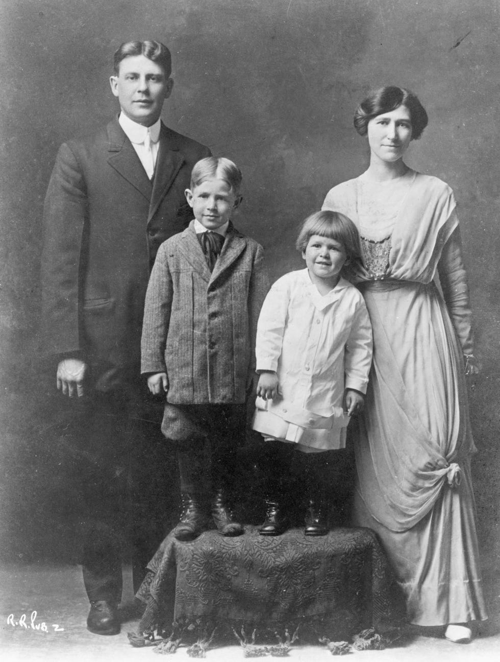 jack reagan, neil reagan, ronald reagan, and nelle reagan pose for a portrait when the boys are both young