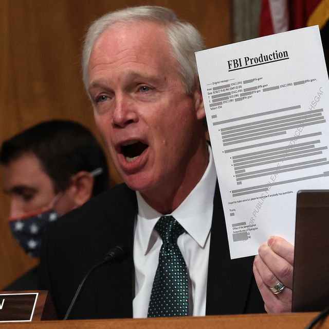 washington, dc   december 03 senate homeland security committee chairman ron johnson r wi holds up a redacted document during a hearing about the crossfire hurricane investigation in the dirksen senate office building on capitol hill on december 03, 2020 in washington, dc crossfire hurricane is the code name for the fbi's 2016 counterintelligence investigation into possible links between president donald trump's associates and russian officials a justice department inspector general report found no political bias in the initiation of the investigation, which resulted in the mueller report finding that the trump campaign did not conspire or coordinate with the russian government photo by chip somodevillagetty images