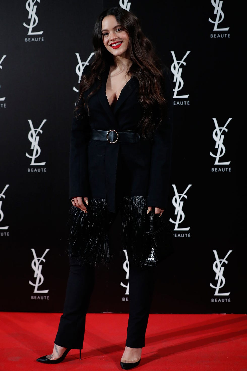 De Rosalía a Marta Hazas pasando por Mónica Cruz. Todos los looks de la alfombra roja de la fiesta YSL The Slim Rouge Pur Couture,
