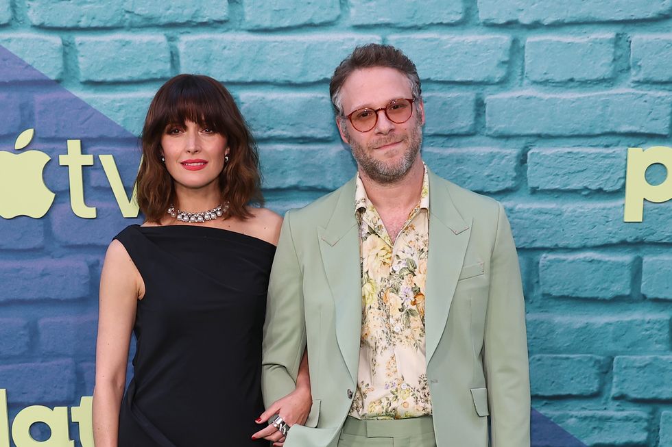 seth rogen poses with rose byrne
