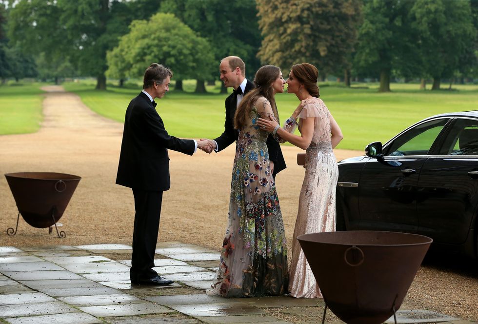 kings lynn, england june 22 hrh prince william and catherine, duchess of cambridge are greeted by david cholmondeley, marquess of cholmondeley and rose cholmondeley, the marchioness of cholmondeley as they attend a gala dinner in support of east anglias childrens hospices nook appeal at houghton hall on june 22, 2016 in kings lynn, england photo by stephen pondgetty images