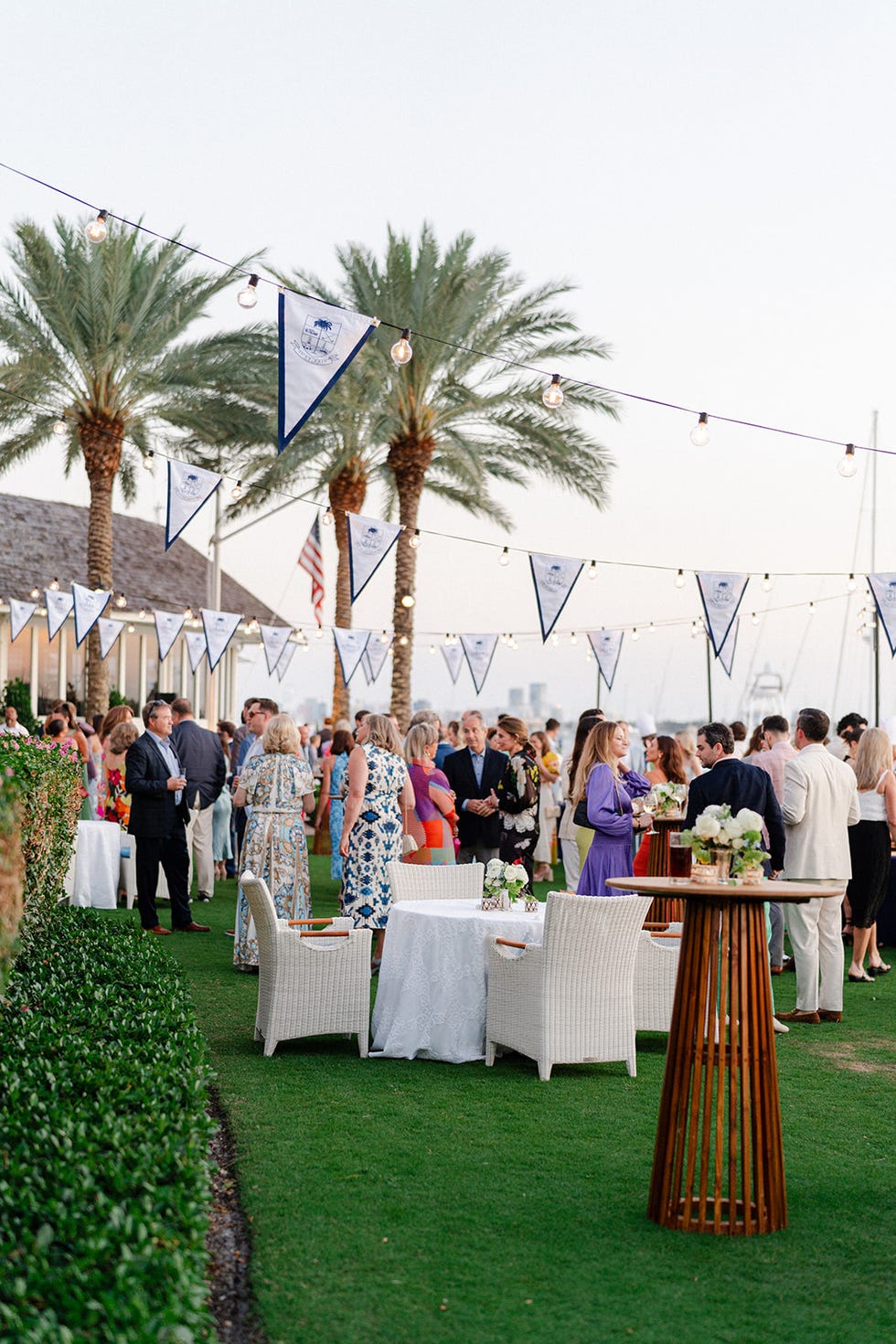 outdoor gathering with people mingling at a festive event