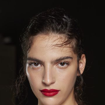a person with a red lipstick