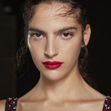 a person with a red lipstick