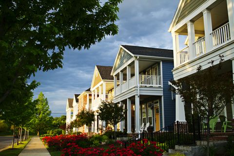 a row of colorful suburban homes