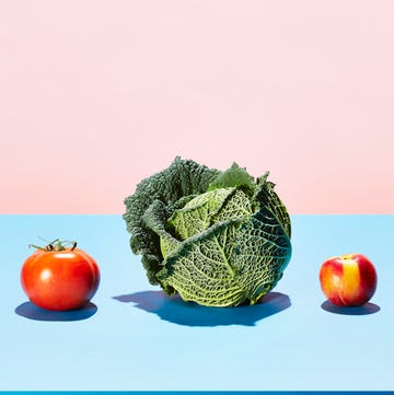 fruits-vegetables a row of different fruits and vegetables on a table top