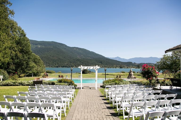 Property, Natural landscape, Grass, Lawn, Hill station, Landscape, Tree, Ceremony, Mountain, Aisle, 