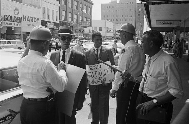 Roy Wilkins (l), Executive Secretary of the NAACP, and Medgar Evers, (c) NAACP field secretary who are picketing outside of a Woolworth's department store in Jackson, Mississippi.