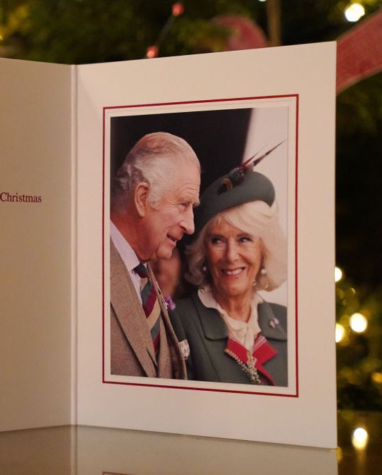 london, england december 11 the 2022 christmas card of king charles iii and the queen consort in front of a christmas tree in clarence house, london, on december 11, 2022 in london, england the photograph was taken at the braemar games on the 3rd september 2022 by samir hussein photo jonathan brady wpa poolgetty images