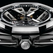 Watch, Analog watch, Fashion accessory, Automotive design, Metal, Vehicle, Brand, Silver, Steel, Wheel, 
