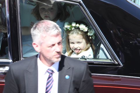 2018 royal wedding princess charlotte sticking out tongue