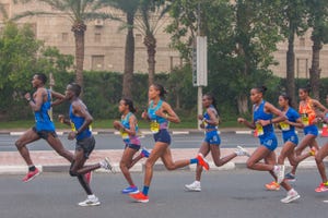 Roza Dereje of Ethiopia is out on the course and on her way...