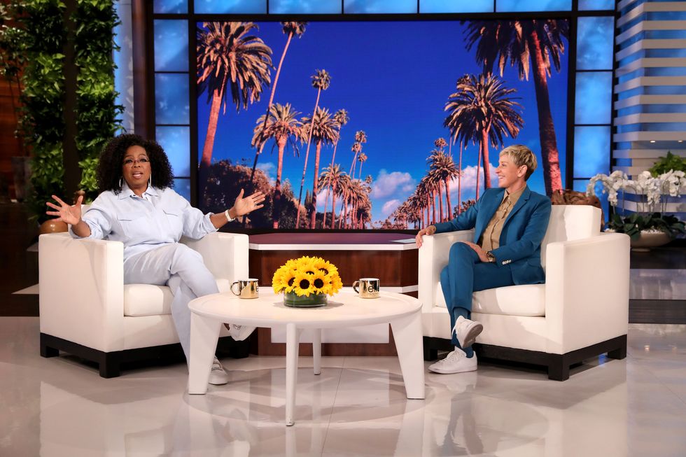 talk show host ellen degeneres with oprah winfrey during a taping of the ellen show