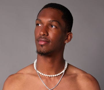 a man with a necklace