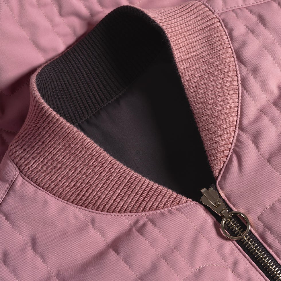 closeup of pink and brown quilted jacket