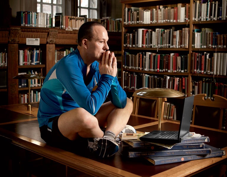 Library, Bookcase, Sitting, Furniture, Public library, Reading, Librarian, Desk, Building, Shelving, 