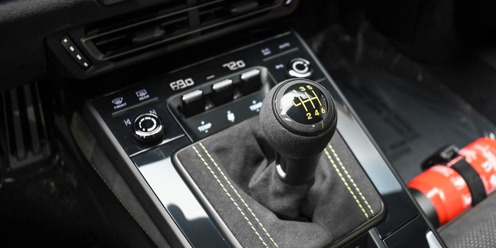 a car steering wheel and dash board