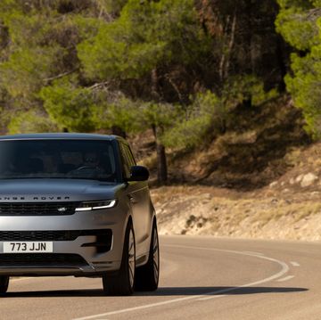 2023 range rover sport p400 driving on a road in spain