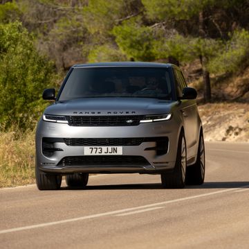 2023 range rover sport p400 driving on a road in spain