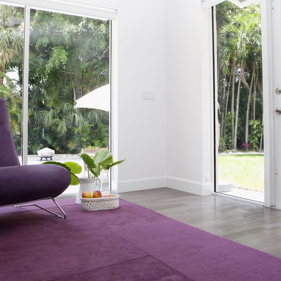 rug, chair and windows in modern living room