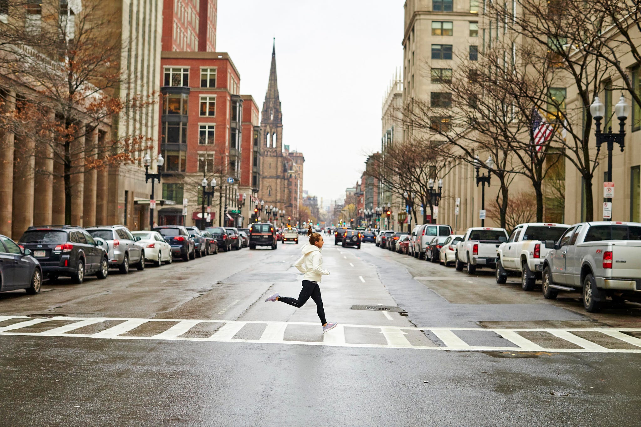 female athlete jogging on street of boston city, , 25 29 years, adult, adults only, architecture, athlete, boston, building, building exterior, built structure, car, caucasian ethnicity, city, city life, color image, cross walk, day, exercising, fitness, full length, healthy lifestyle, horizontal, in a row, jogging, massachusetts, mode of transport, motion, one person, one woman only, one young woman only, only women, on the move, outdoors, people, side view, sky, sports clothing, street, the way forward, transportation, tree, usa, women, young adult, young women, aurora photos, josh campbell,