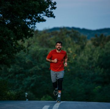 man lace-up running outside, exercise and mental health