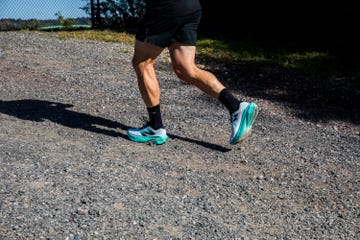 a man running in new balance supercomp v3 running shoes