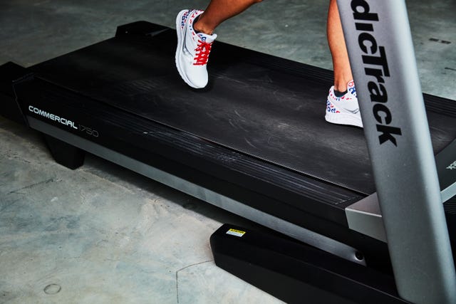 a person running on a nordictrack 1750 commercial treadmill