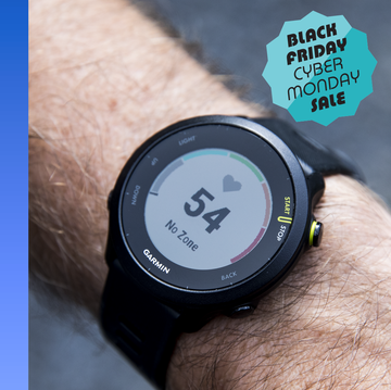 a woman jogging with a child in a stroller alongside a smartwatch display a woman jogging with a child in a stroller alongside a smartwatch display