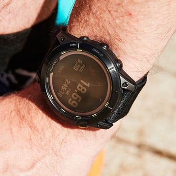 activity tracker displaying time pace and other metrics on a wrist activity tracker displaying time pace and other metrics on a wrist