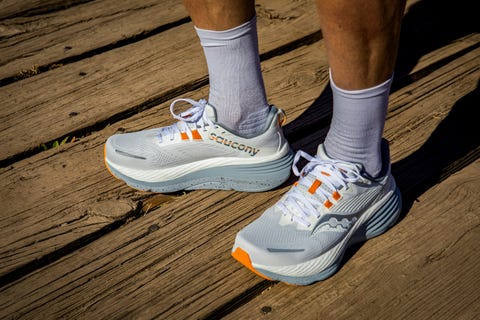 saucony, asics, best stability running shoes, pair of shoes on a wooden platform