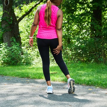 RWD a runner holding her hamstring