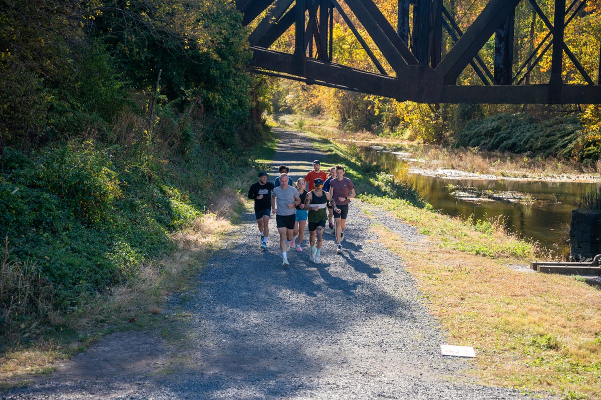 group of runners on a trail